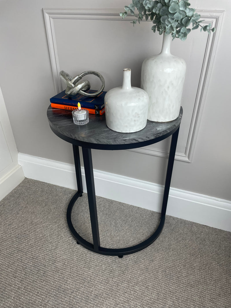 Black marble look top half moon table