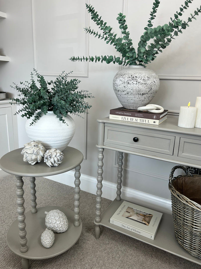 Neutral taupe round side table textures beaded leg