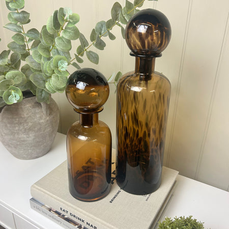 Large tortoise shell print glass bottle with top lid