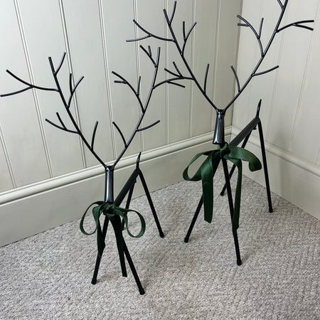 Set of two black metal reindeers 67cm