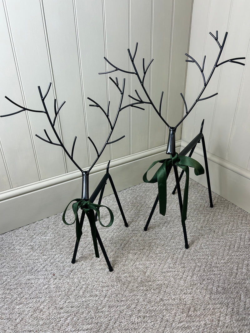 Set of two black metal reindeers 67cm