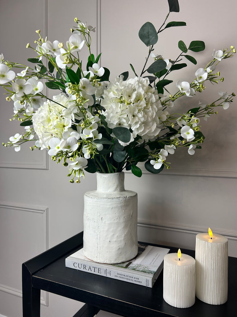 Eucalyptus, white hydrangeas and Florence spray stem arrangement