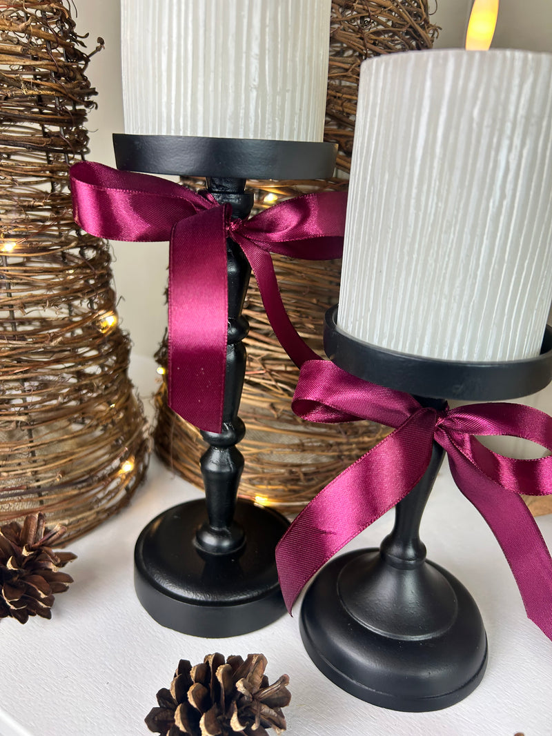 Set of Two Tall staggered height Black Metal Candlesticks 23cm