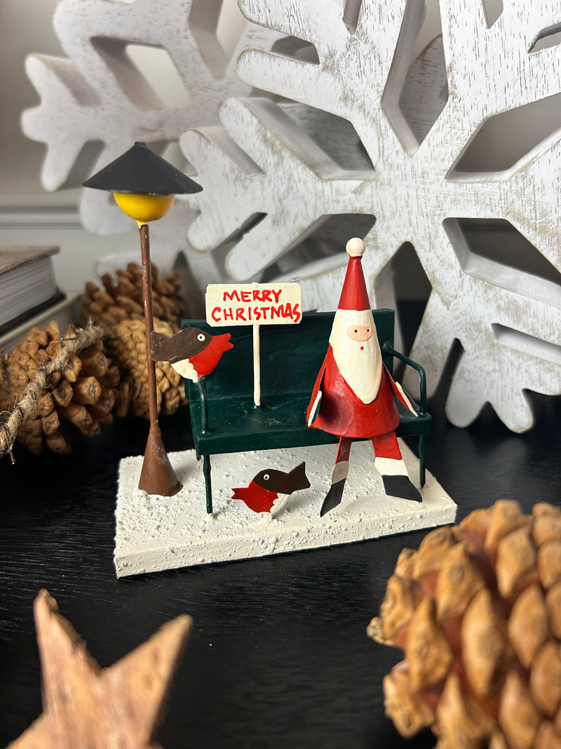 Traditional Santa on bench merry Christmas