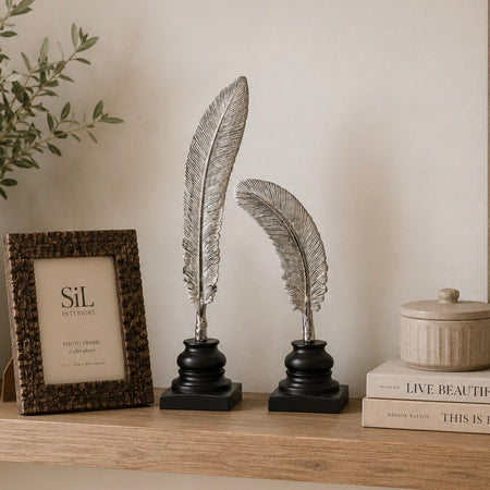Tall set of two standing feather ornaments