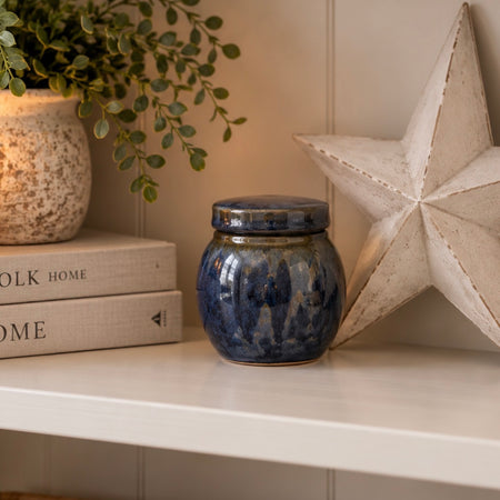 Small navy blue lid jar