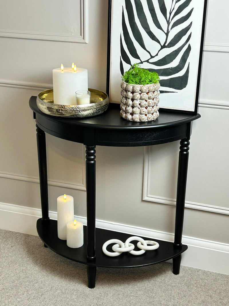 Black half moon table with turned legs