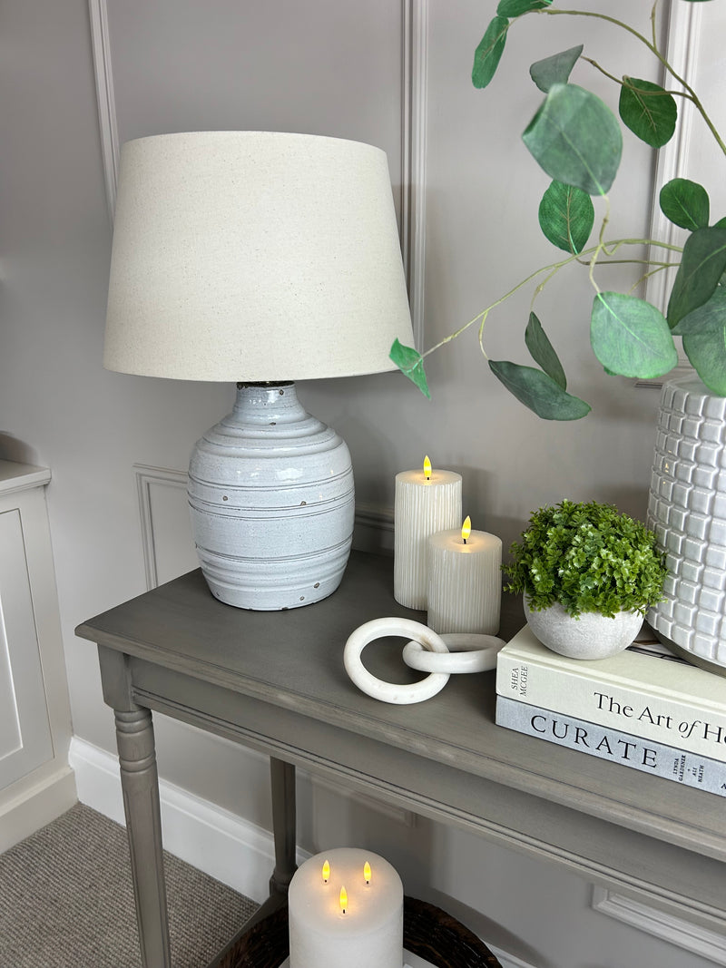 Thalia stone distressed lamp with linen shade