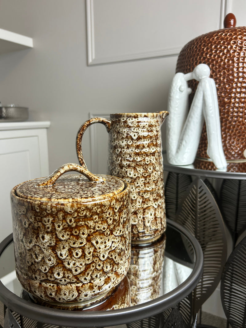 Chunky mottled brown ceramic lidded jar