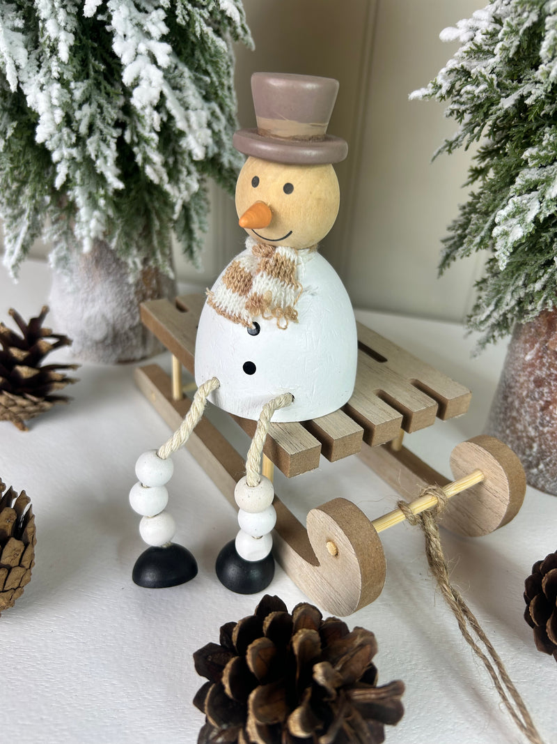 Sitting metal snowman 11cm
