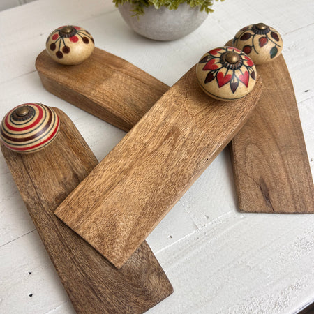 Colourful wood door wedges, mixed styles