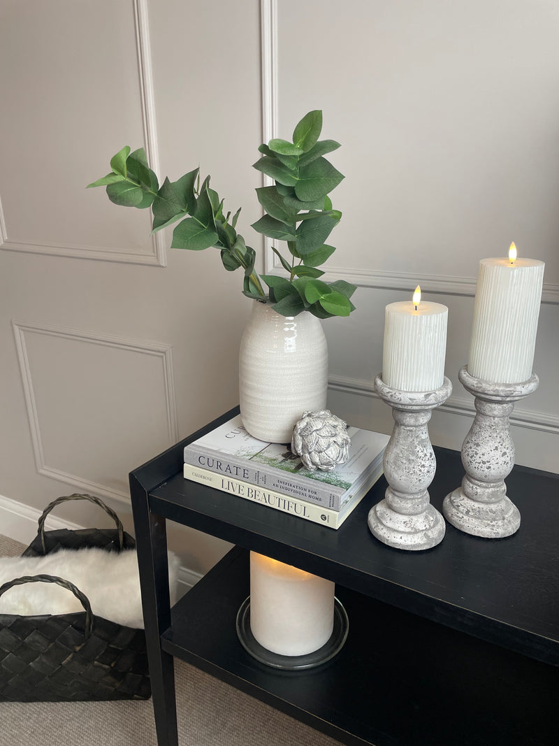 Set of two stone candle sticks
