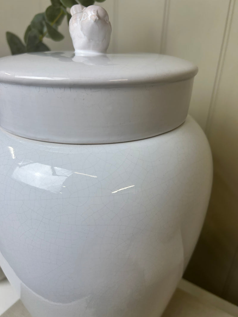 White ceramic bird topped ginger lidded jar