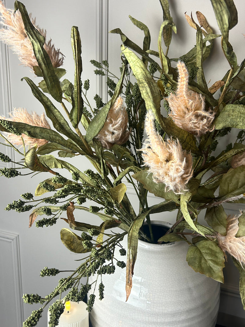Green tall reed, green sorghum grass and mocha oyster alexis stem arrangement
