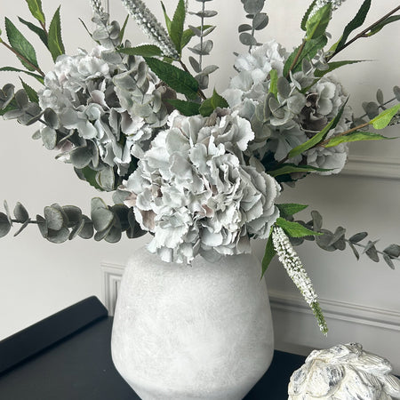 Bouquet arrangement grey/taupe hydrangeas white Veronica eucalyptus bunch.
