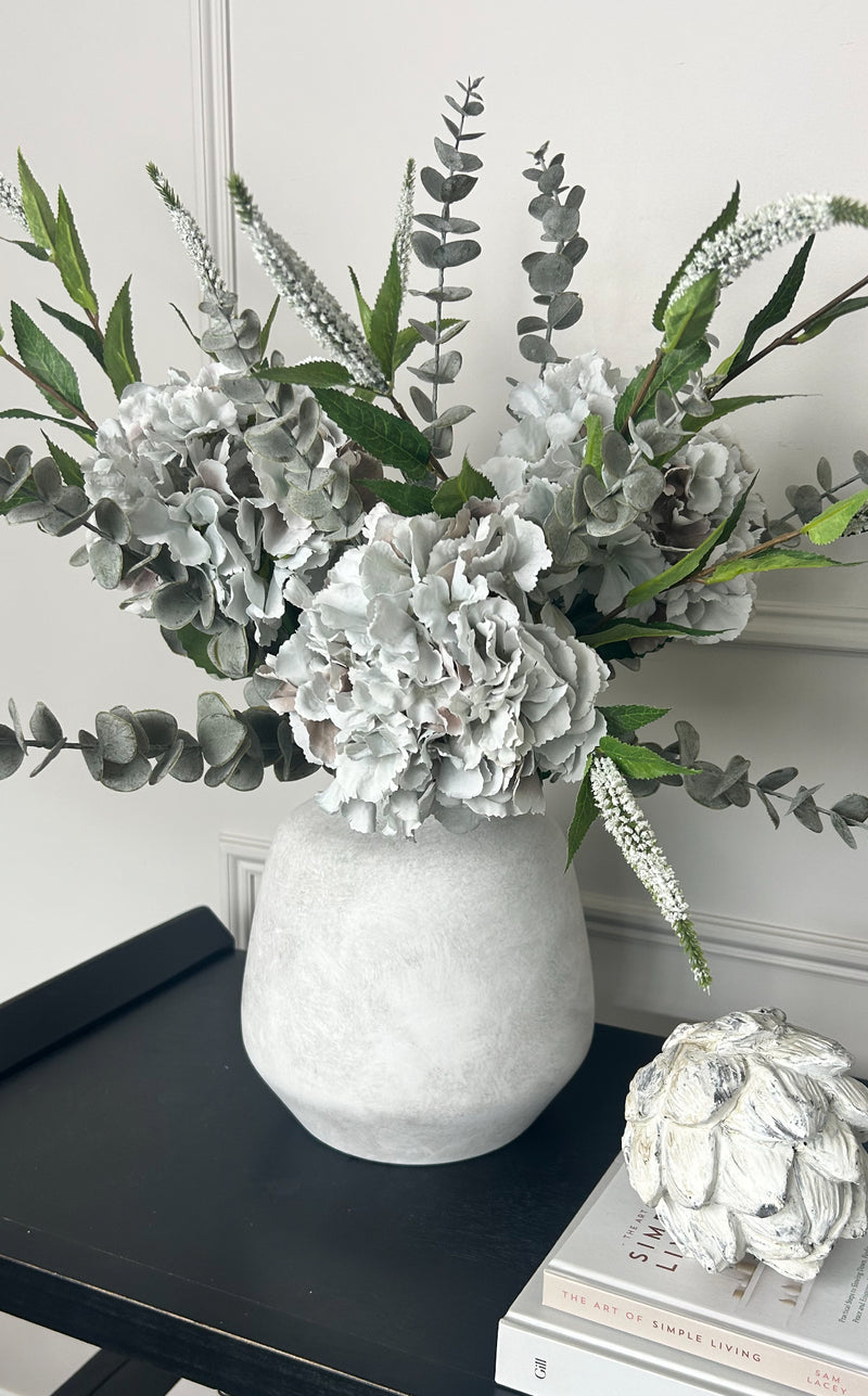 Bouquet arrangement grey/taupe hydrangeas white Veronica eucalyptus bunch.