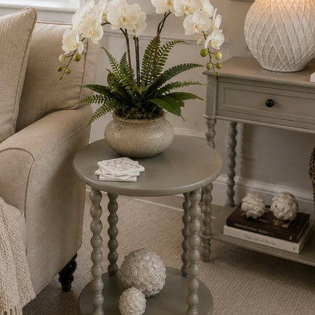 Neutral taupe round side table textures beaded leg