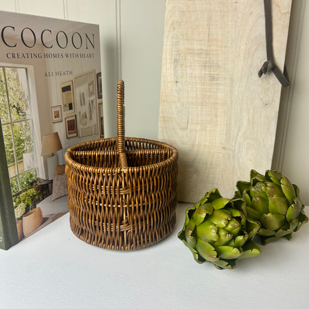 Dark wicker woven utensils holder