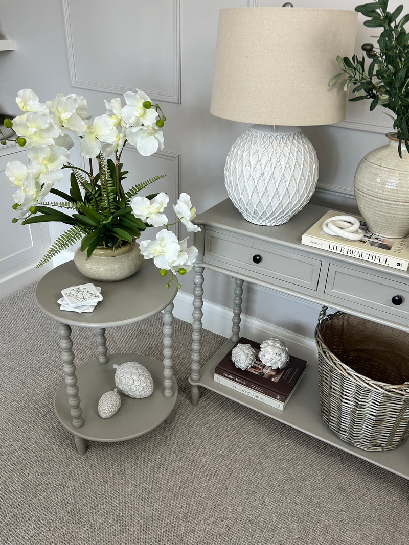 White vanda orchid in ceramic planter pot