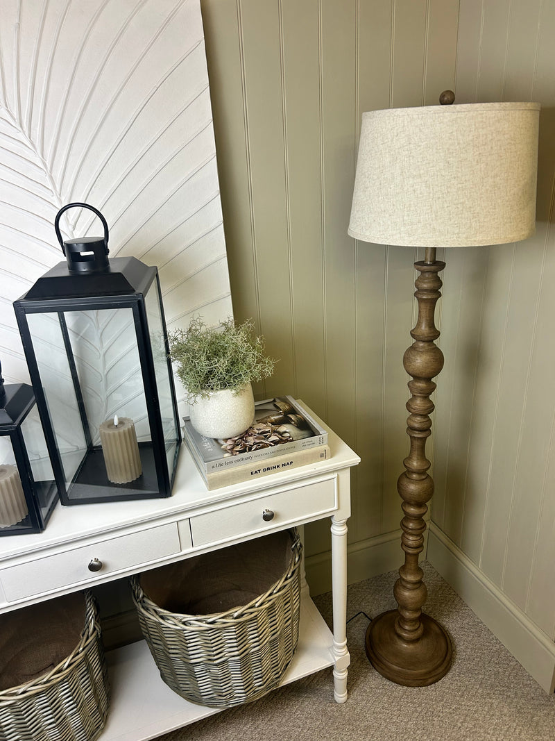 Wooden shaped floor lamp with linen shade