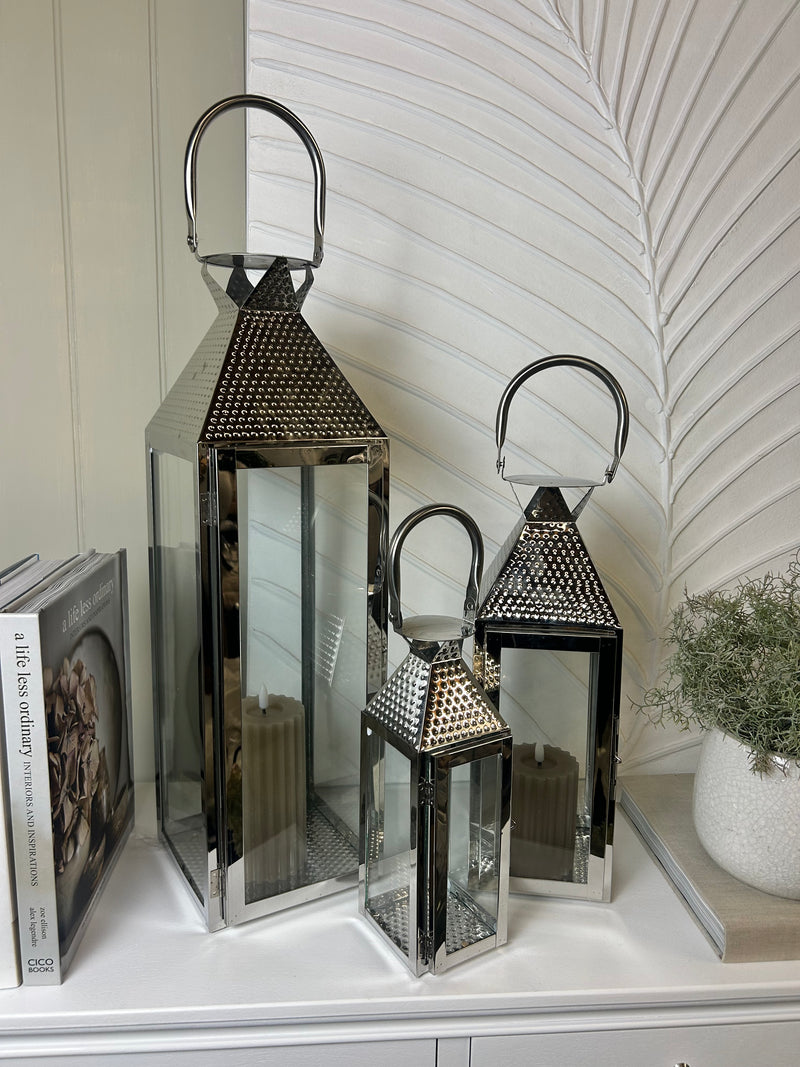 Set of three hammered chrome metal lantern