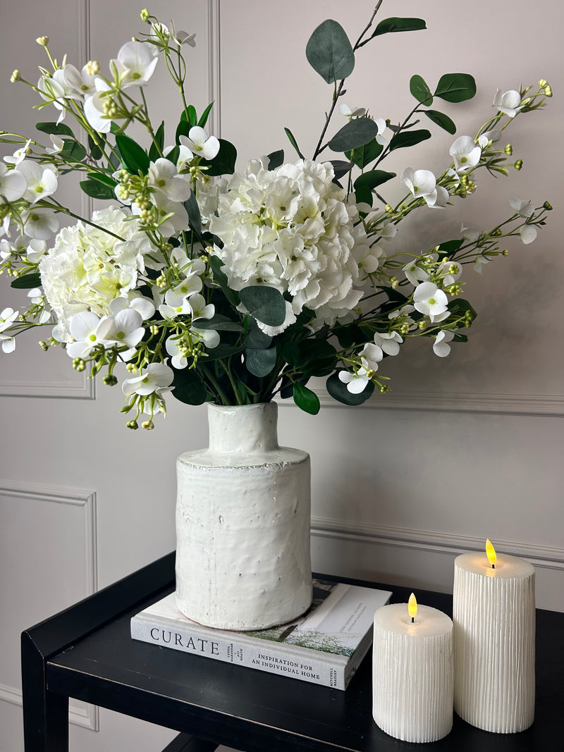 Eucalyptus, white hydrangeas and Florence spray stem arrangement