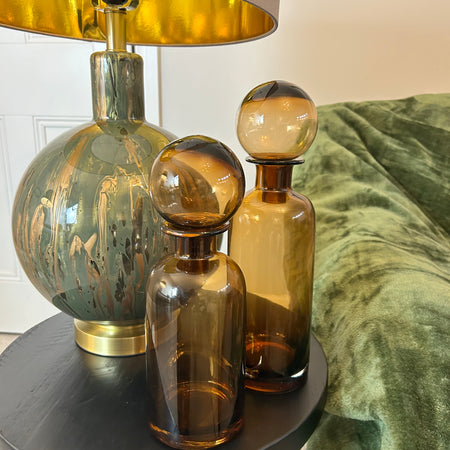 Amber glass ball top bottle