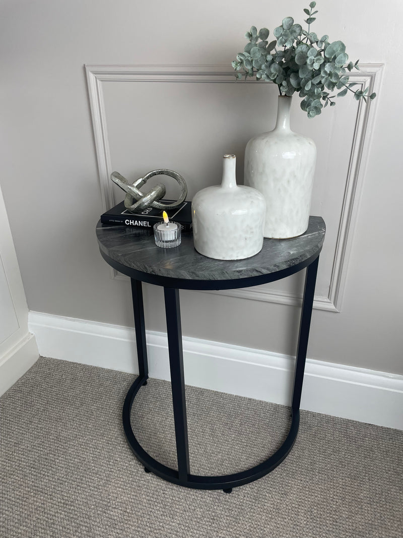 Black marble look top half moon table