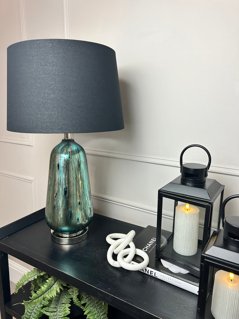 Blue and silver abstract peacock glass lamp with black shade