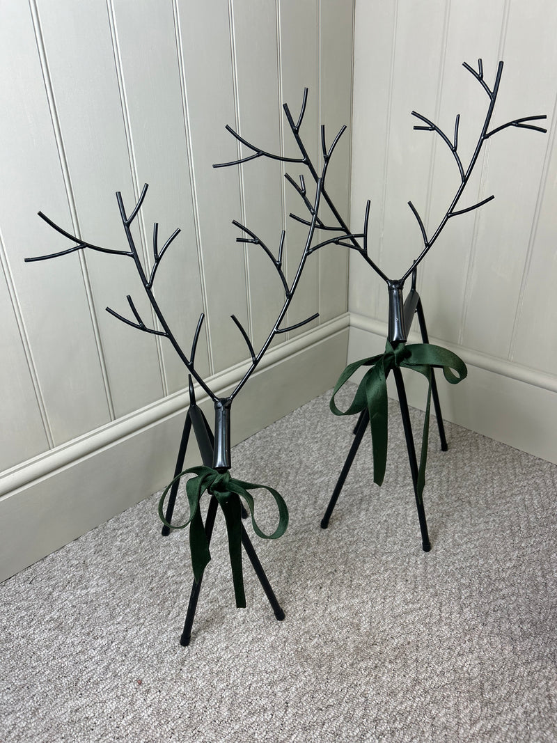 Set of two black metal reindeers 67cm
