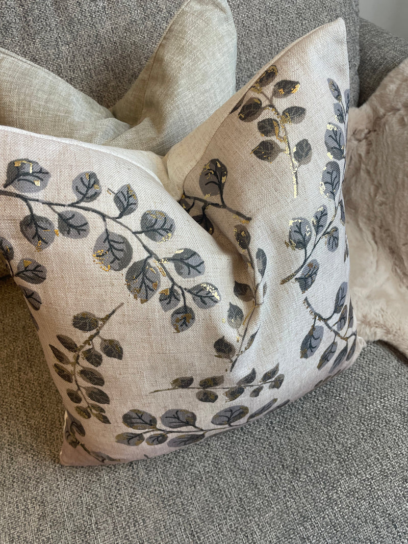 Gold leaf detail luxe cushion