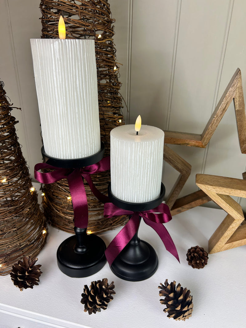 Set of Two Tall staggered height Black Metal Candlesticks 23cm