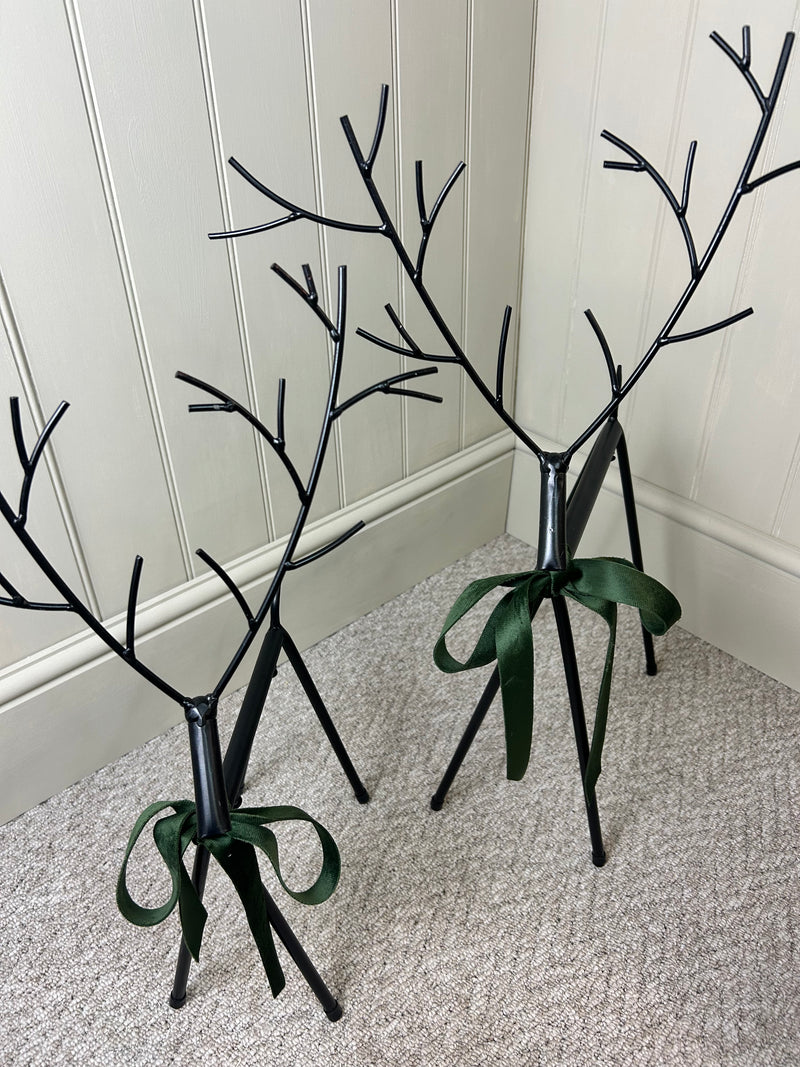 Set of two black metal reindeers 67cm
