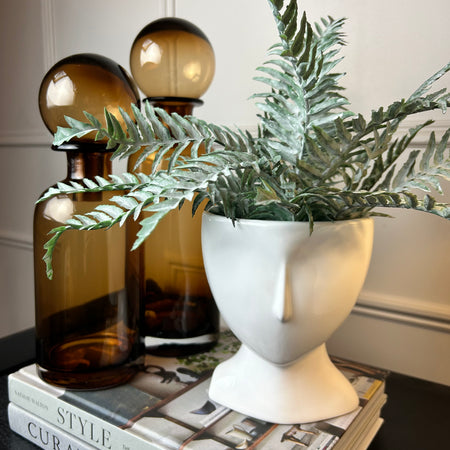 White ceramic face planter