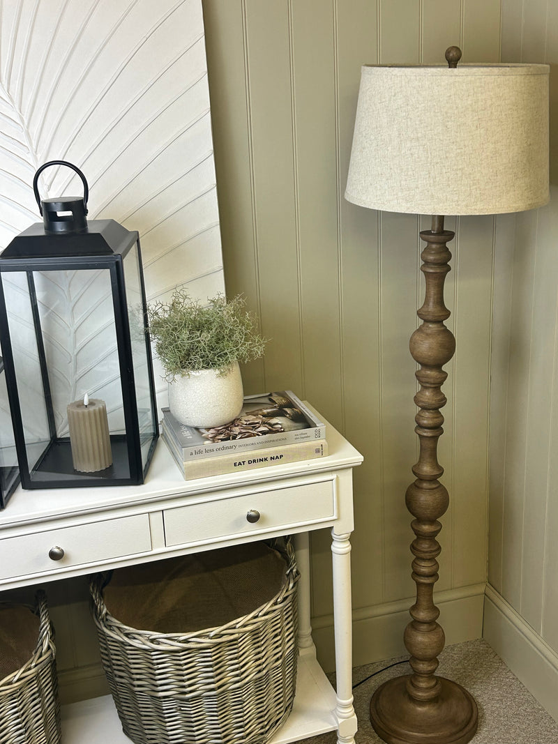 Wooden shaped floor lamp with linen shade