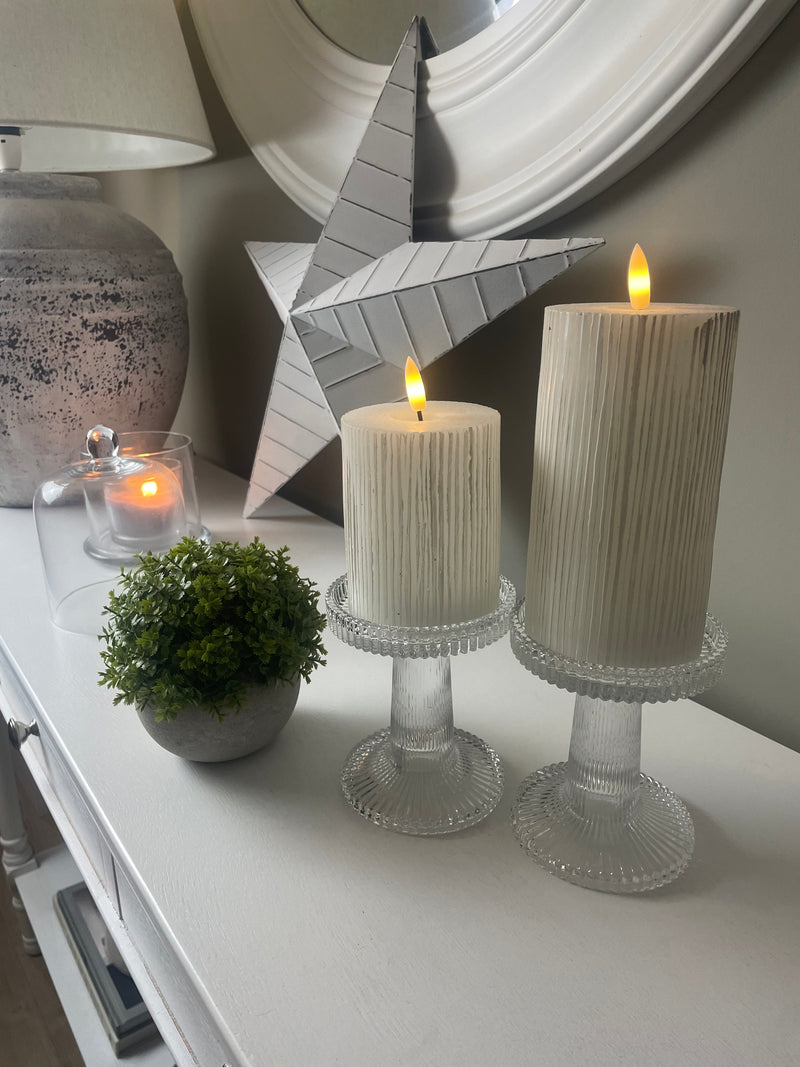 Pair of ribbed glass candle sticks holders