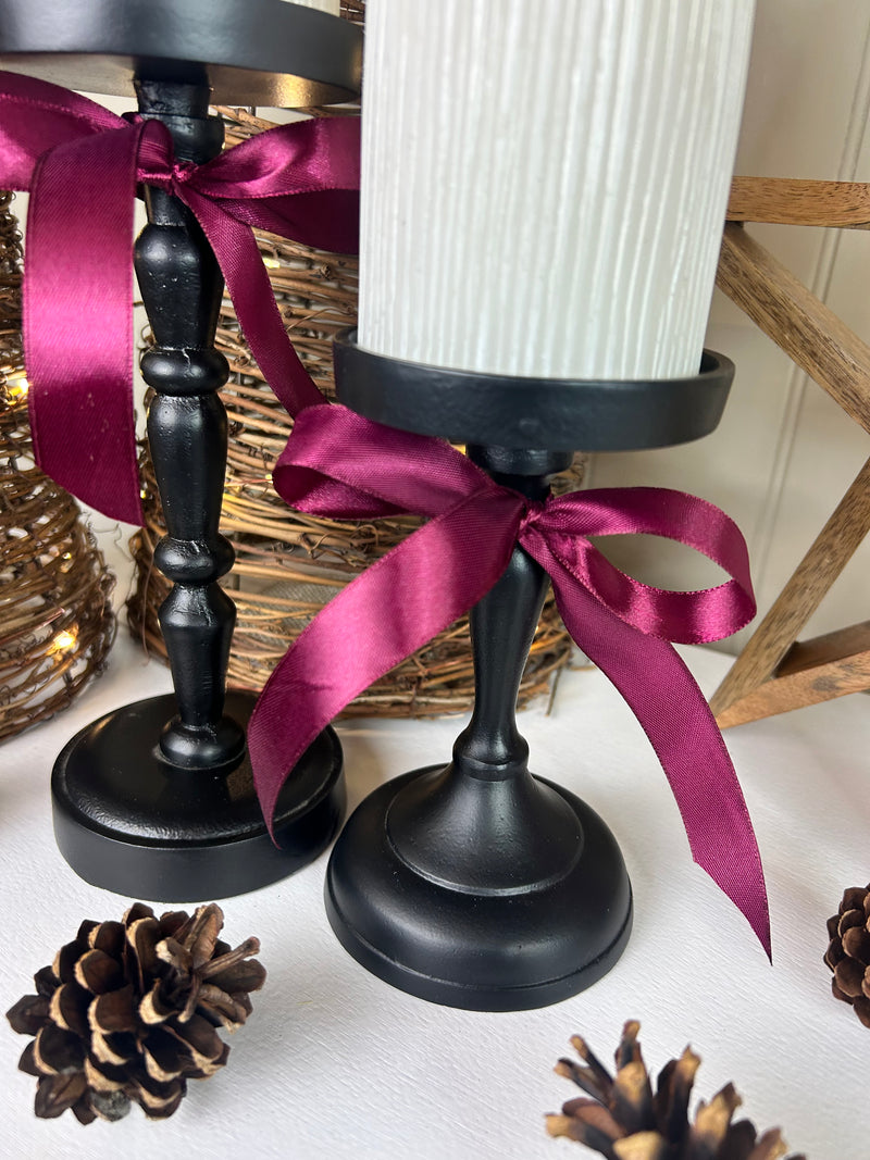 Set of Two Tall staggered height Black Metal Candlesticks 23cm
