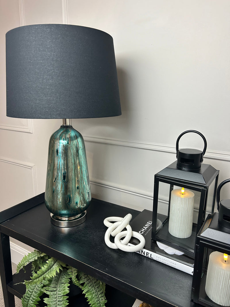 Blue and silver abstract peacock glass lamp with black shade