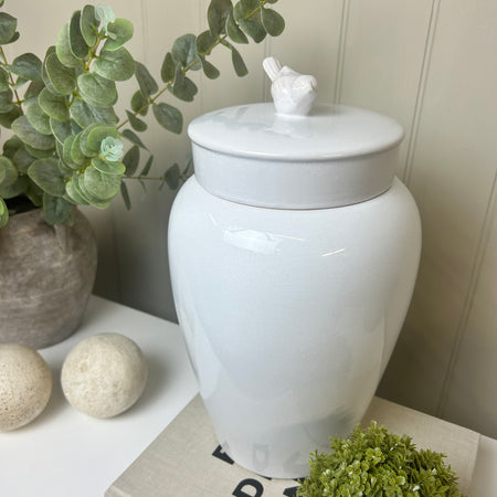 White ceramic bird topped ginger lidded jar