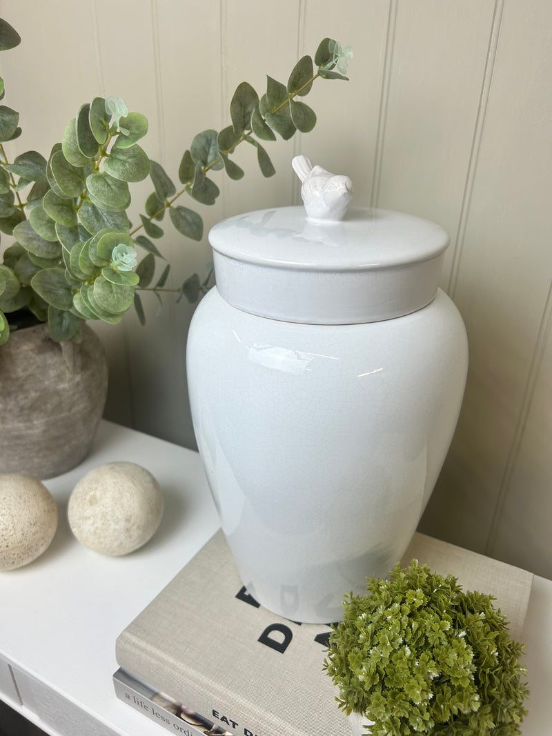 White ceramic bird topped ginger lidded jar