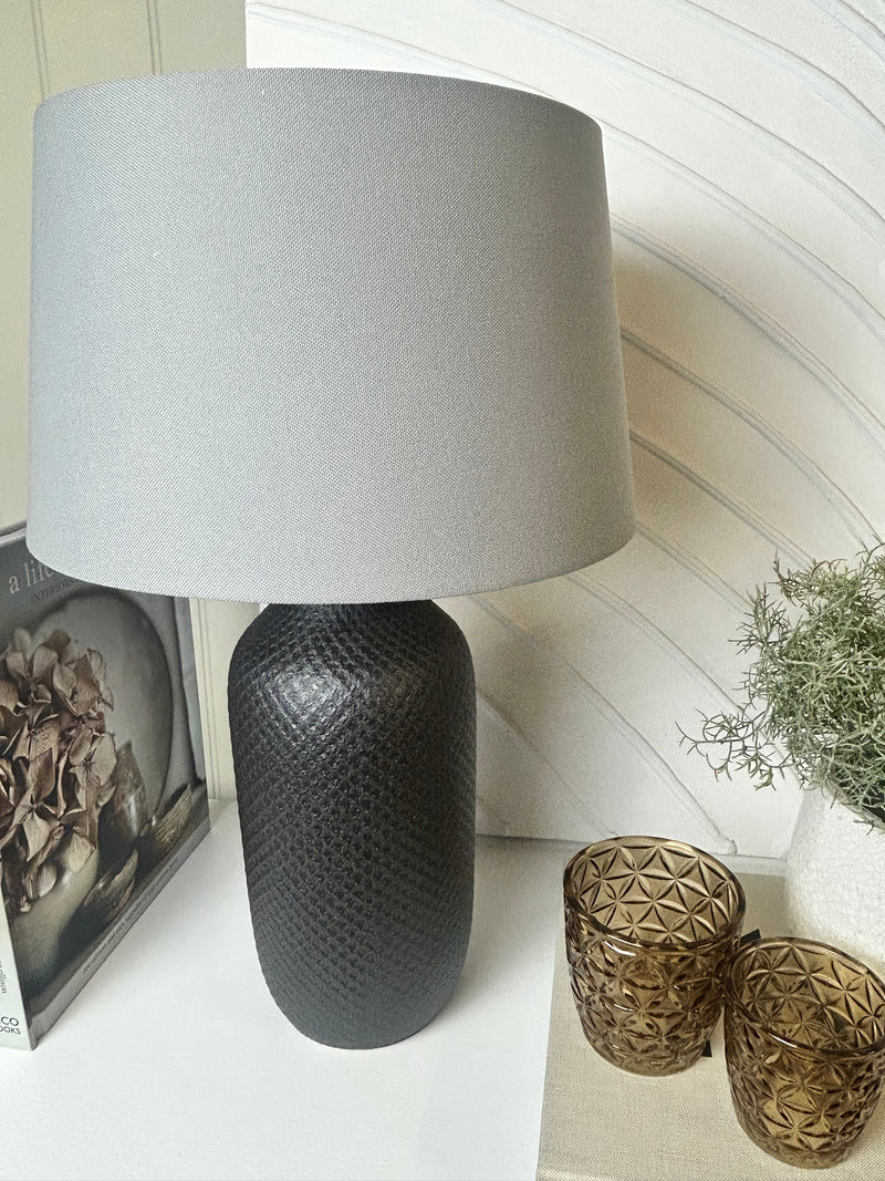 Black textured ceramic lamp with shade
