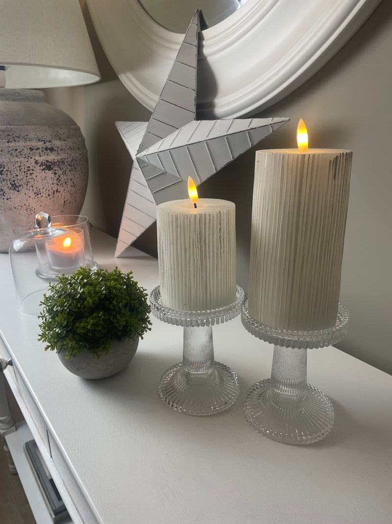 Pair of ribbed glass candle sticks holders