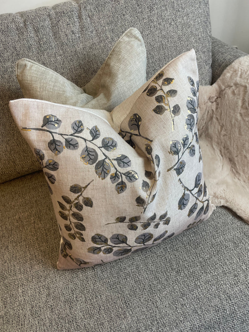 Gold leaf detail luxe cushion