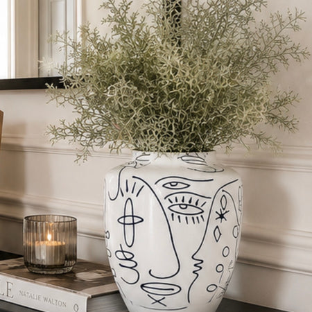 Medium white blue face faces vase