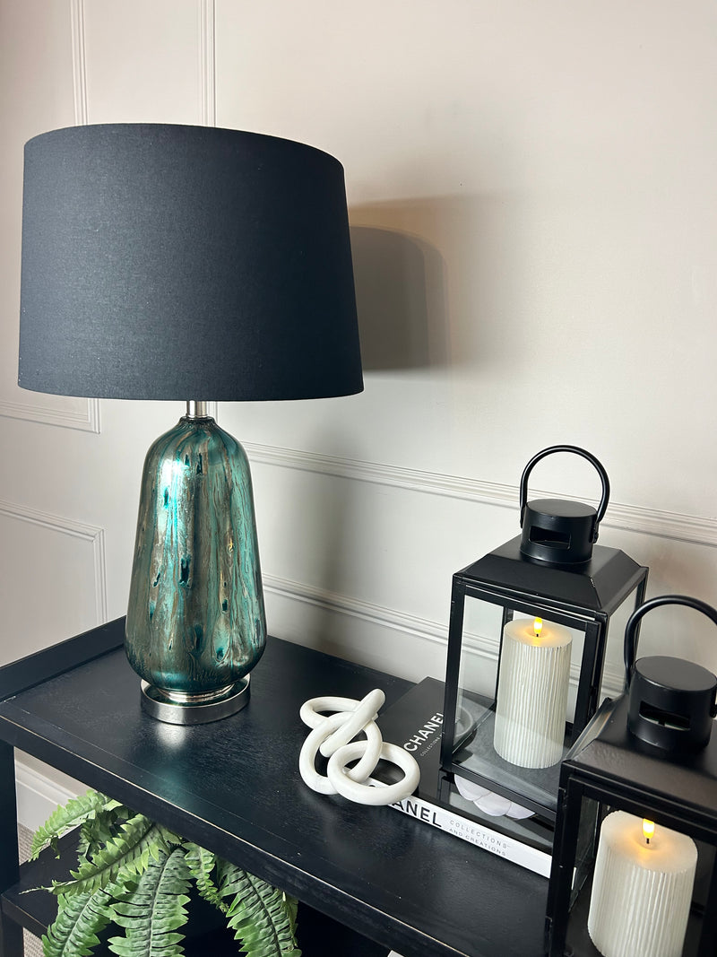 Blue and silver abstract peacock glass lamp with black shade