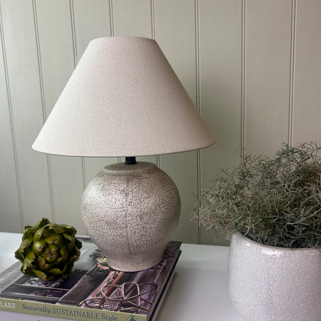 Stone look neural round lamp with linen shade