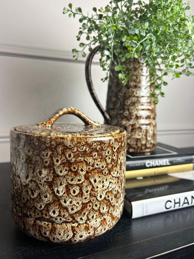 Chunky mottled brown ceramic lidded jar