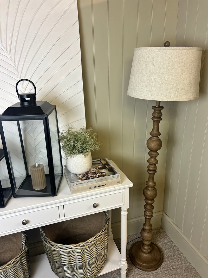 Wooden shaped floor lamp with linen shade