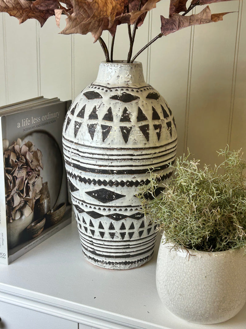 White vase with eucalyptus