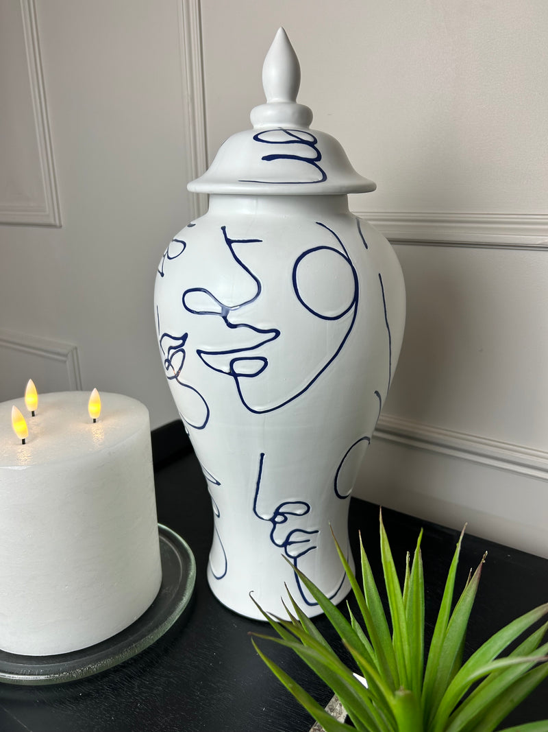 Faces white blue ceramic ginger jar
